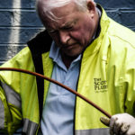 The Scottish Plumber checking a sewer for cracks.