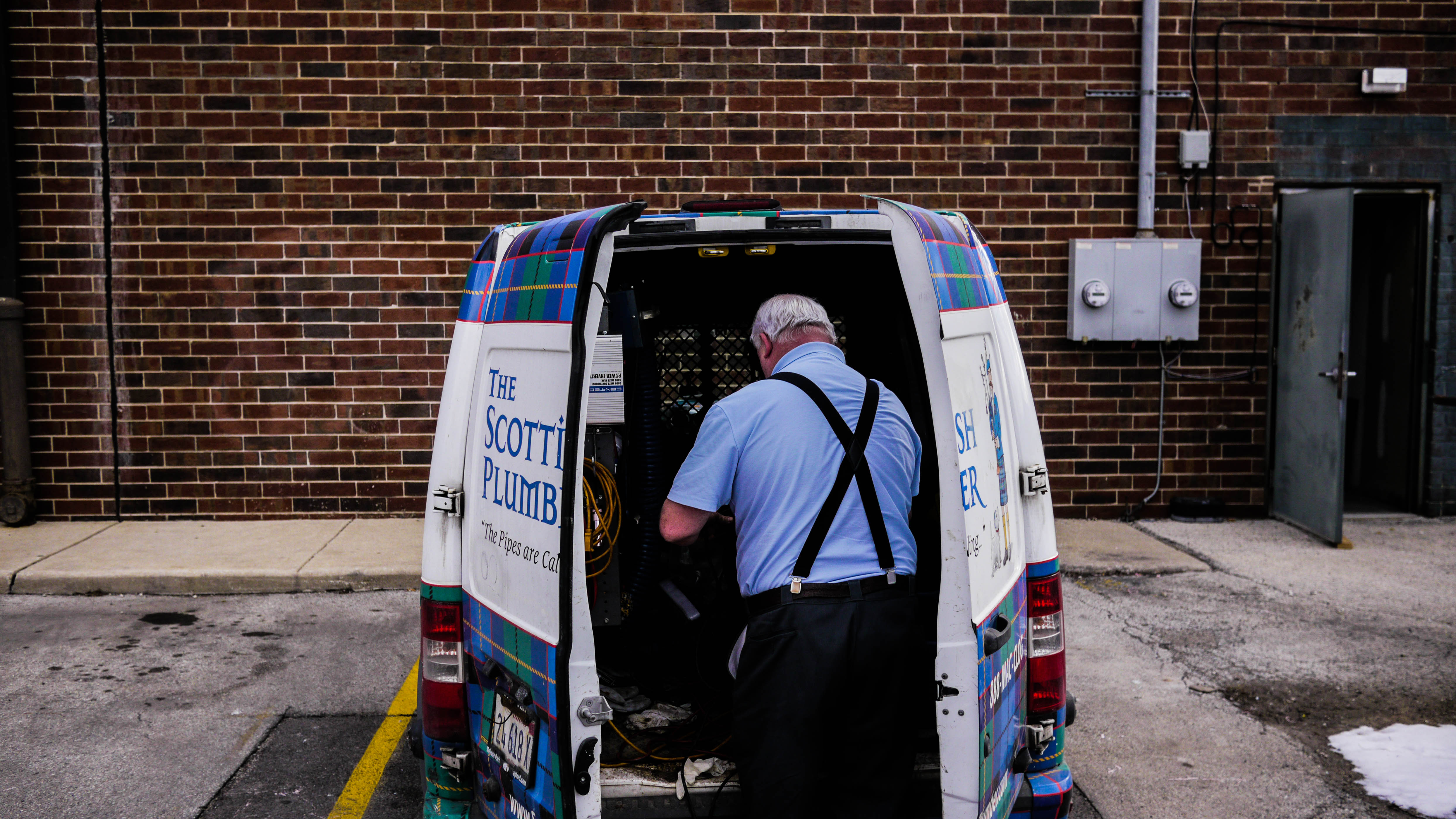 The Scottish Plumber prepares for a repair